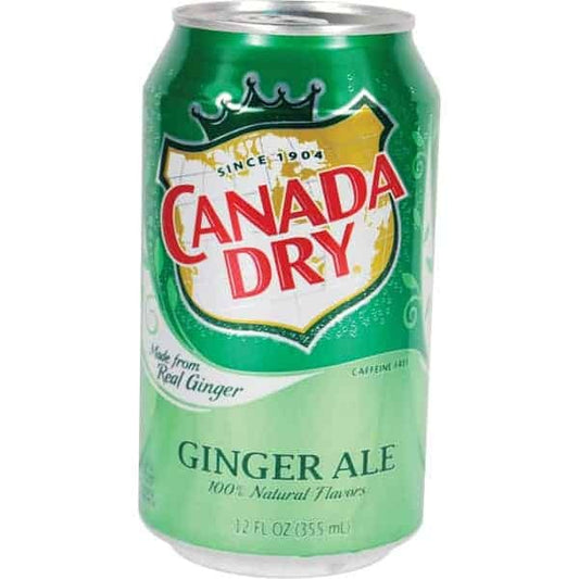 Green can of Canada Dry Ginger Ale on a white background