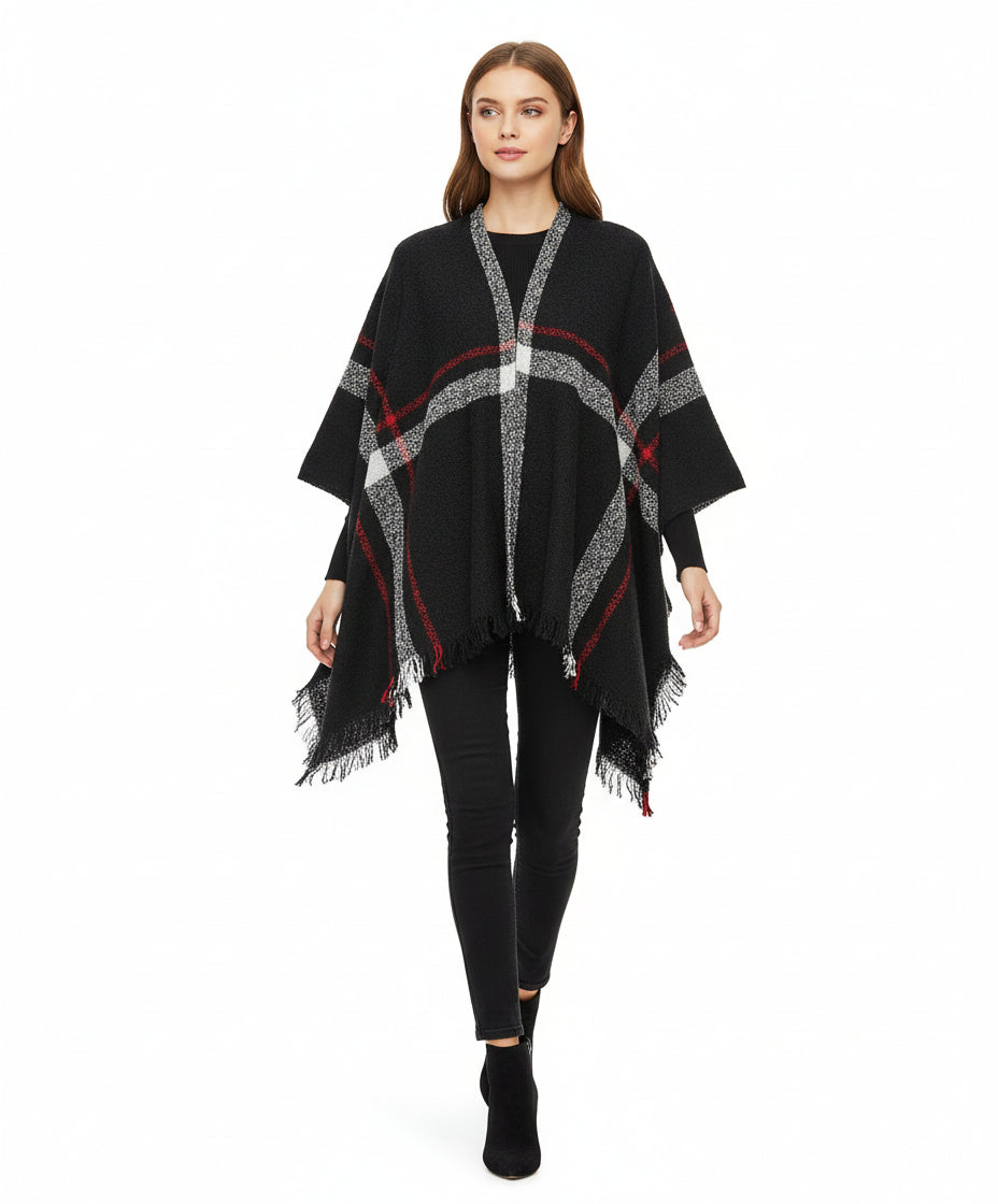 Black poncho with red and white pattern on a mannequin against a white background