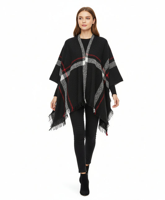 Black poncho with red and white pattern on a mannequin against a white background