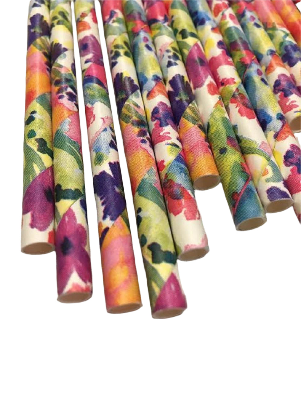 Colorful floral-patterned paper rolls on a textured surface